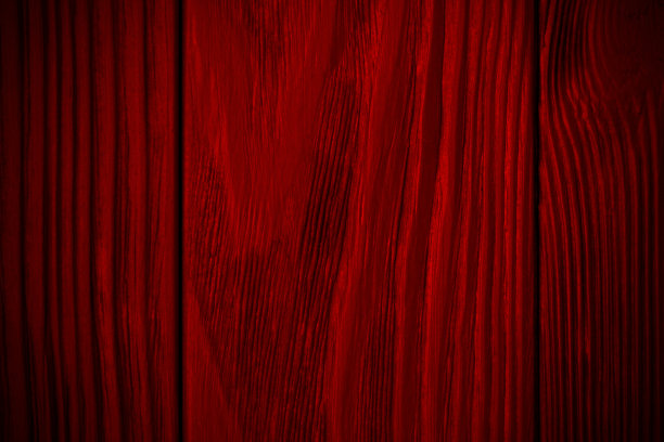 红色纹理的木制背景与黑色。装饰图案。复古明亮的背景图片下载