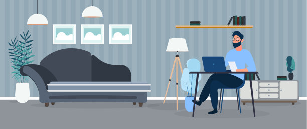 一个戴眼镜的人坐在他办公室的桌子旁图片下载