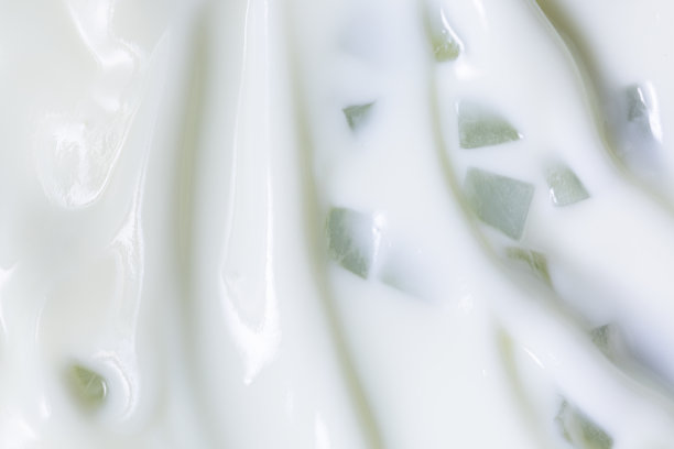 宏酸奶，奶油质地背景。希腊酸奶，酸奶油特写。白色天然奶油乳制品宏观俯视图图片下载