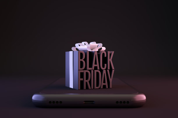 黑色星期五背景，智能手机上的黑色礼盒图片下载