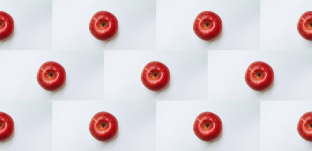 自然红苹果图案背景。图片下载