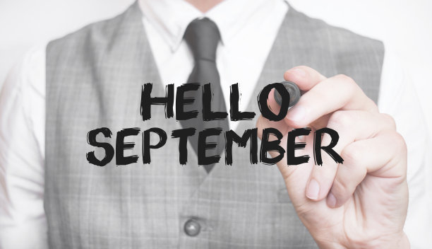商人用记号笔写你好九月，商业概念图片下载