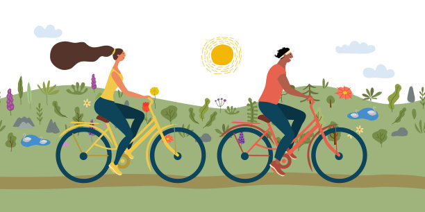 一对夫妇在公园草地和山上骑自行车图片下载