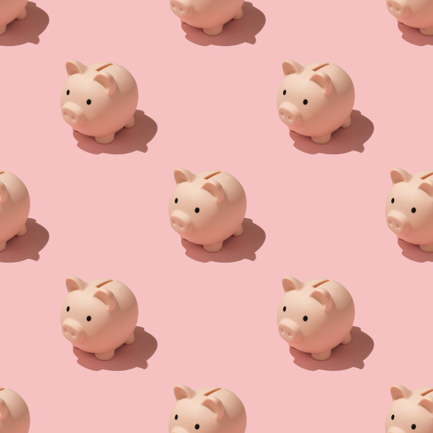 俯视图照片的小猪储蓄罐图案孤立的浅粉红色背景图片下载
