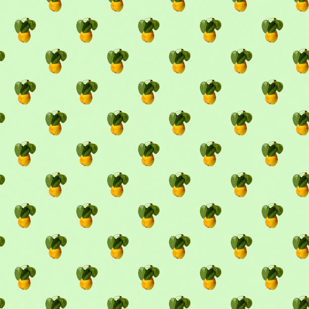 成熟多汁的黄梨，颜色背景上有绿色的叶子。无缝模式。图片下载