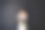 时尚新娘身穿白色镂空婚纱，无头纱，背站着，手捧婚礼花束图片下载