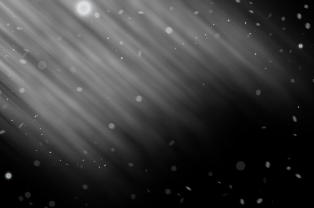 白色的雪与光线在黑色的背景图片下载