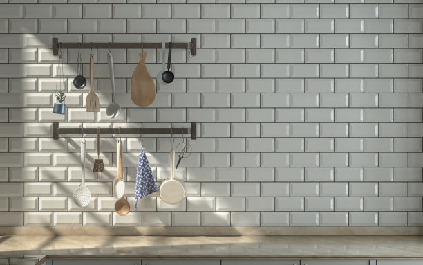 正视图厨房与大理石厨房台面下温暖的晨光，白色陶瓷交替瓷砖墙，和墙上挂厨房货架上的各种厨房用具，3d渲染图片下载