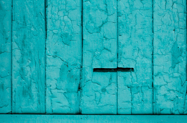 旧的木板。旧漆剥落。树状结构。老式的木头背景。木栅栏。图片下载