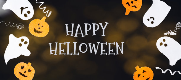 万圣节旗帜。黑色的背景上有鬼和南瓜的毛毡和题字万圣节快乐图片下载