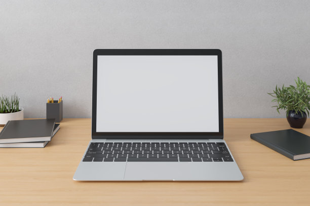 笔记本电脑与模型屏幕上的桌子在内部。模型。图片下载