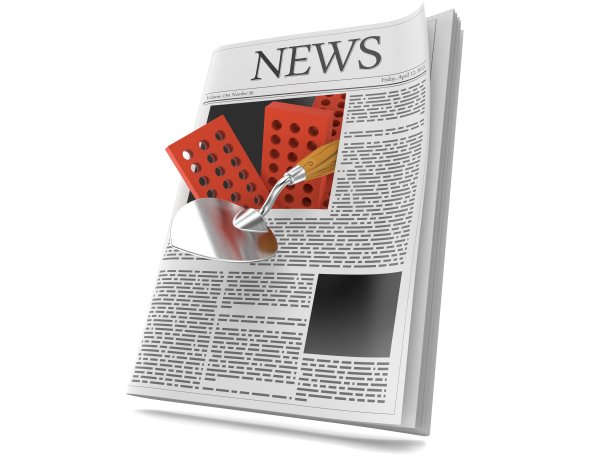 报纸里面有泥铲和砖块图片下载