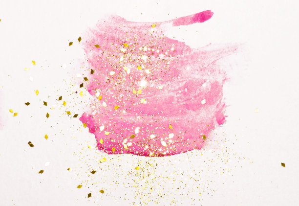 抽象的粉红色水彩飞溅和金色闪烁的复古色彩图片下载