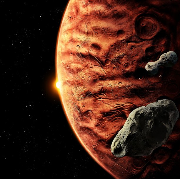 红色星球的表面。日出在一个布满陨石坑的岩石行星上。图片下载