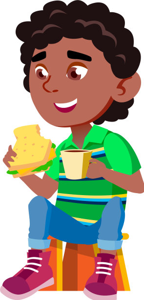 男孩吃着三明治，喝着可可图片下载