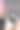 一名男发型师正在用智能手机给她的客户拍粉色短发。图片下载