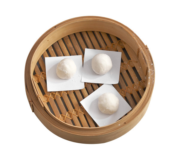 白底竹笼里的包子图片下载