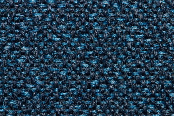 蓝色双色调藏青色羊毛织物针织纯色样本模式。图片下载
