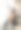 照片与噪音。女人坐在夏天阳台街餐厅与朋友斗牛梗狗。女孩身穿黑色复古长裙。性感的裸腿。红鞋。背景的美丽城市图片下载