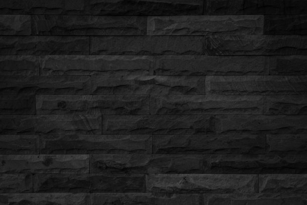 抽象暗砖墙面纹理背景图案，空砖墙面纹理。室内砖墙漆成黑色，旧的空白混凝土网格参差不齐，家居办公设计背景装饰。图片下载