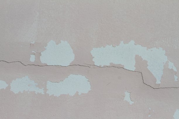 粉色水泥墙面背景开裂，油漆剥落图片下载