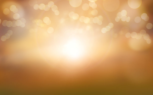 一个秋天的自然，秋天的背景模糊的树叶在日落。图片下载