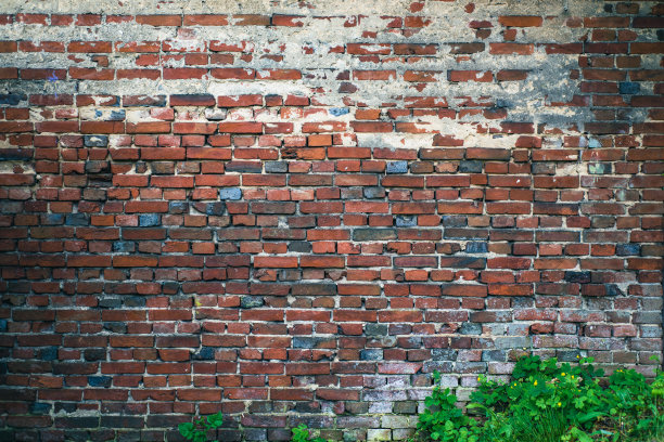 砖砌的旧墙，颜色深红色。水平的背景。外观。图片下载