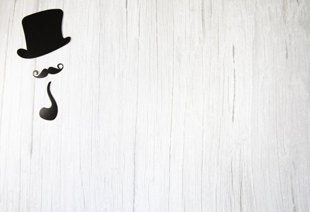 假胡子，领结和帽子在白色木制背景。国际男人节和父亲节概念平躺，俯视图，复制空间图片下载