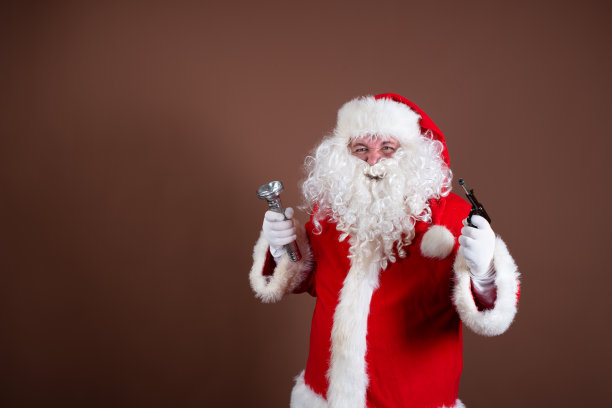 有趣的圣诞老人读书。图片下载