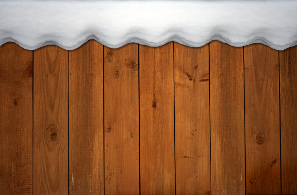 棕色木制背景与雪图片下载