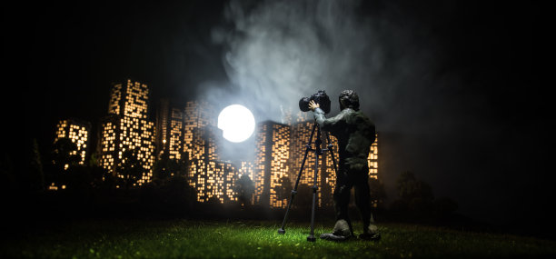 卡通风格的城市建筑。带有灯光的现实城市建筑微缩模型。背景。图片下载