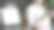 桌上放着空白平板电脑，背景上坐着一位美女。图片下载