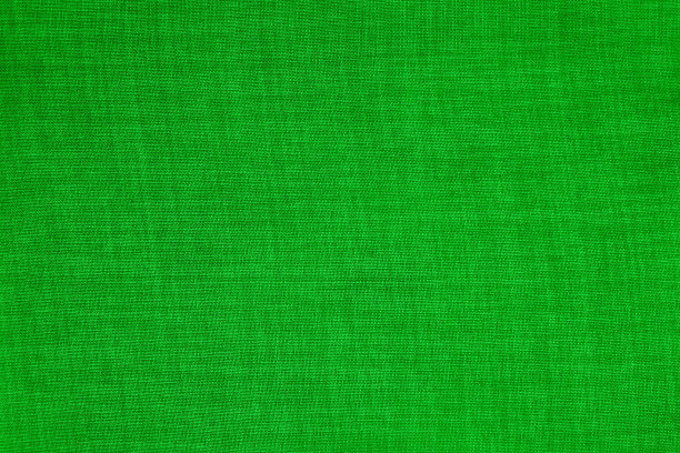 面料以深绿色布纹为背景，自然纺织图案。图片下载