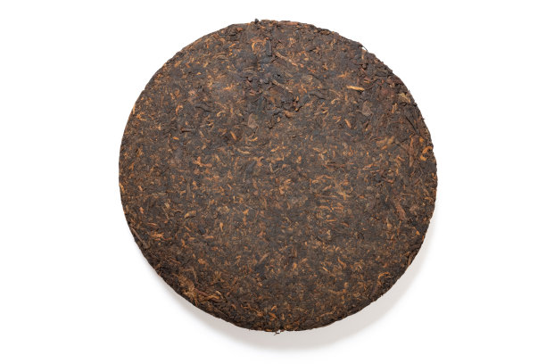 俯视图普洱茶饼或山茶饼上的白色图片下载