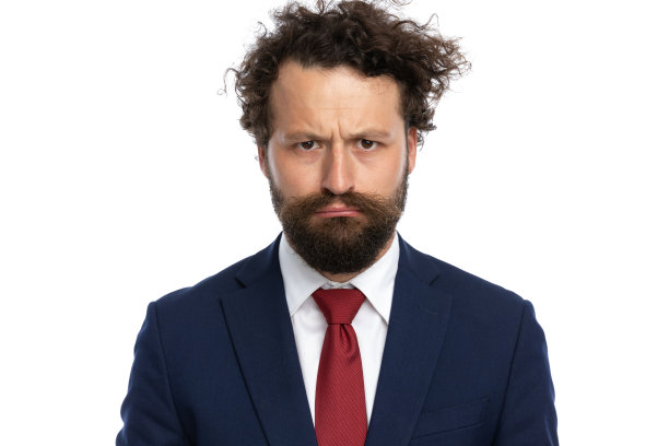 性感的商人感到失望，看着镜头图片下载