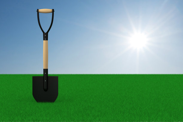 天空背景上的绿色草地和铲子。3 d iillustration图片下载