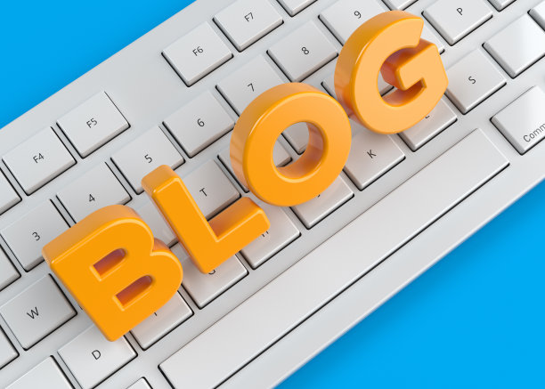 橙色的博客文本和电脑键盘。图片下载