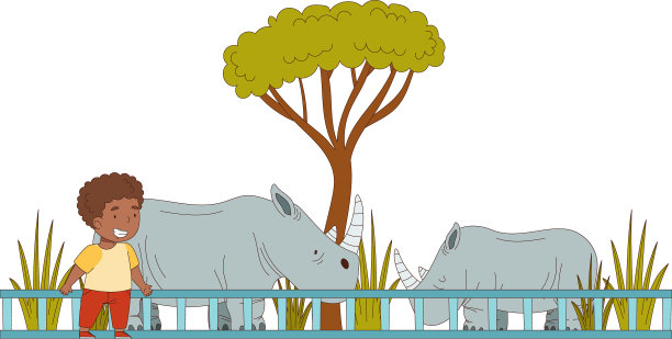 快乐的非裔美国小男孩看着犀牛图片下载