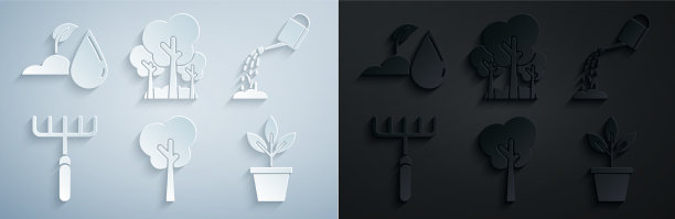 用花园水耙设置树木浇水罐图片下载