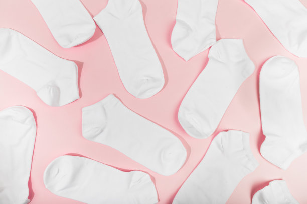 粉红色袜子背景上的粉红色图片下载