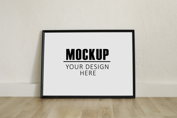 框架，海报模型与水平黑色框架。空的画框站在木地板上。为你的图片或文字腾出空间，复制空间。极简主义的设计。图片下载