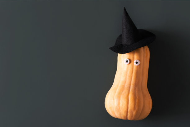 滑稽的南瓜脸和帽子，黑色图片下载