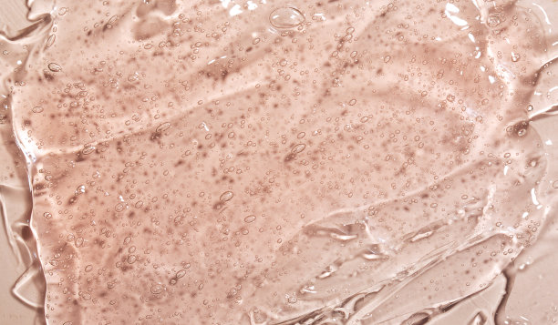 美容精华啫哩质感。带气泡背景的透明护肤霜图片下载