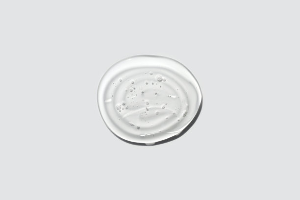 轻透明圆形凝胶滴孤立在白色背景。前视图。病毒防护或化妆品概念。面部精华液纹理接近。图片下载
