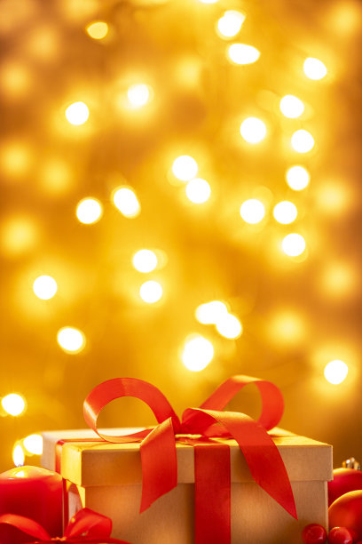 圣诞礼物盒与散焦灯背景图片下载