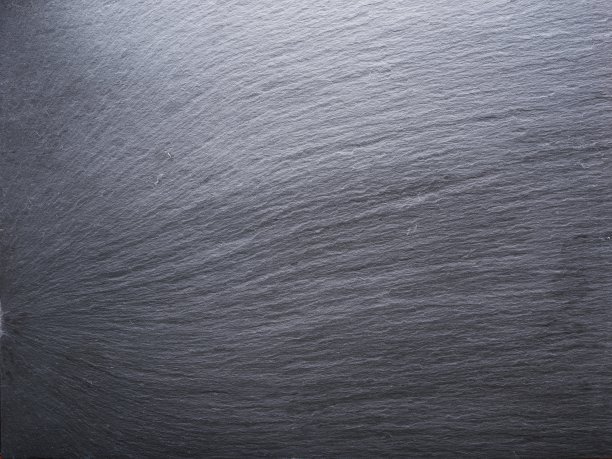 粗糙的石墨背景。图片下载