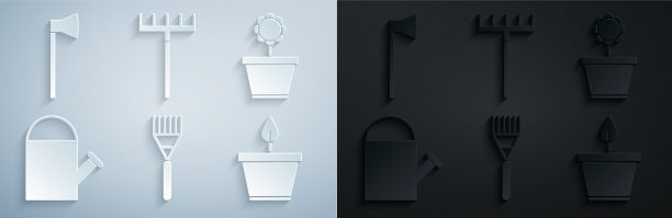 将花园耙花置于花盆喷壶中图片下载