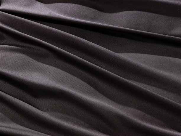 背景纹理，背景，图案，布褶蓝色。光泽完成折叠缎面织物是一种轻，有光泽的光泽和美丽的类型的织物，使最终的设计时尚和迷人图片下载