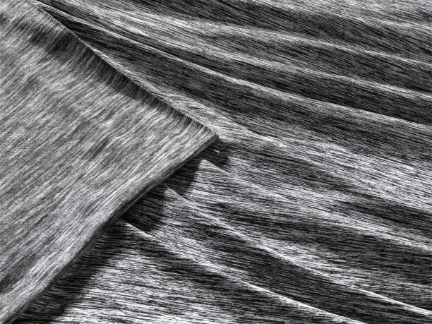 背景纹理，背景，图案，布褶蓝色。光泽完成折叠缎面织物是一种轻，有光泽的光泽和美丽的类型的织物，使最终的设计时尚和迷人图片下载