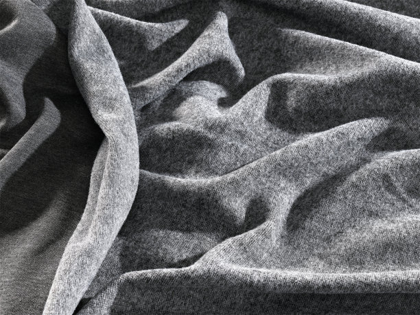 背景纹理，背景，图案，布褶蓝色。光泽完成折叠缎面织物是一种轻，有光泽的光泽和美丽的类型的织物，使最终的设计时尚和迷人图片下载